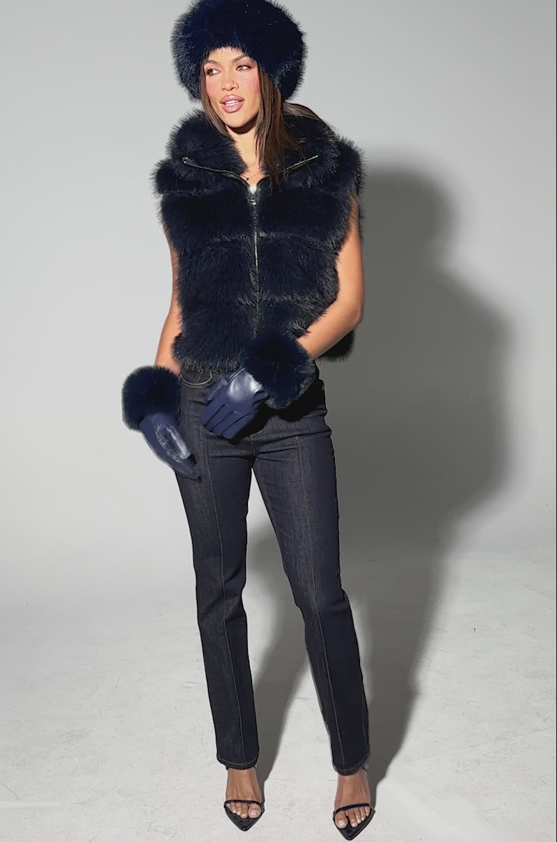 Video of person modeling the FAUX FUR VEST IN NAVY