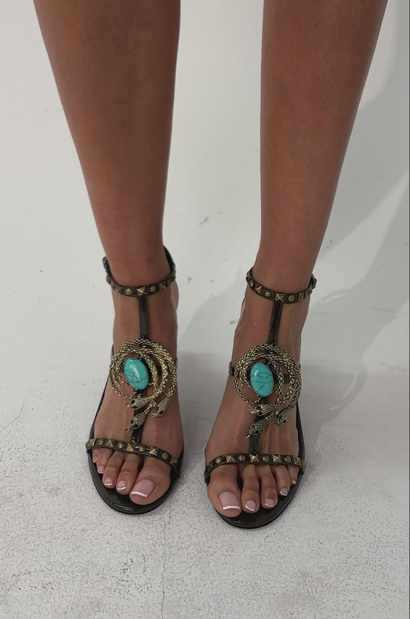 A video of a person wearing the AZALEA WANG REPUTATION OLIVE PU EMBELLISHED STILETTO SANDAL.