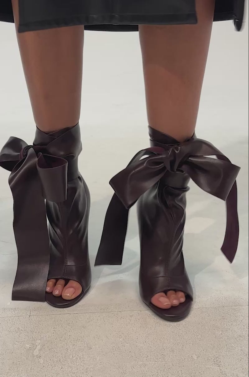 Video of woman modeling the AZALEA WANG KLARICE PURPLE NOIR STILETTO BOOTIE 