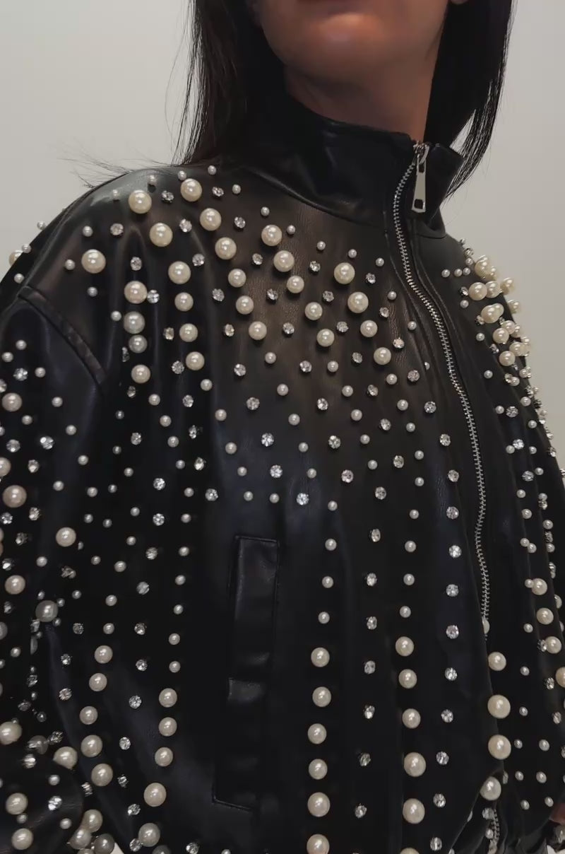 Video of a woman modeling the EUPHORIA EMBELLISHED BOMBER.