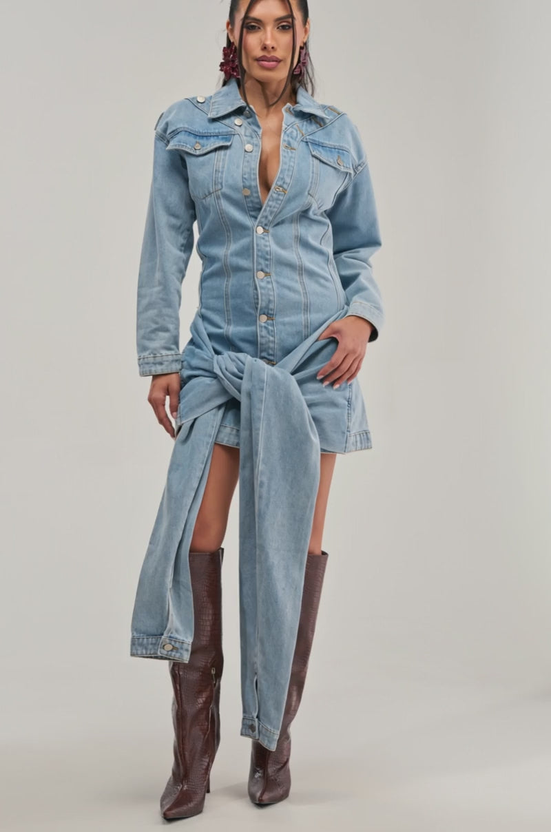 Video of a woman modeling the MAGNETIC ENERGY DENIM MINI DRESS.