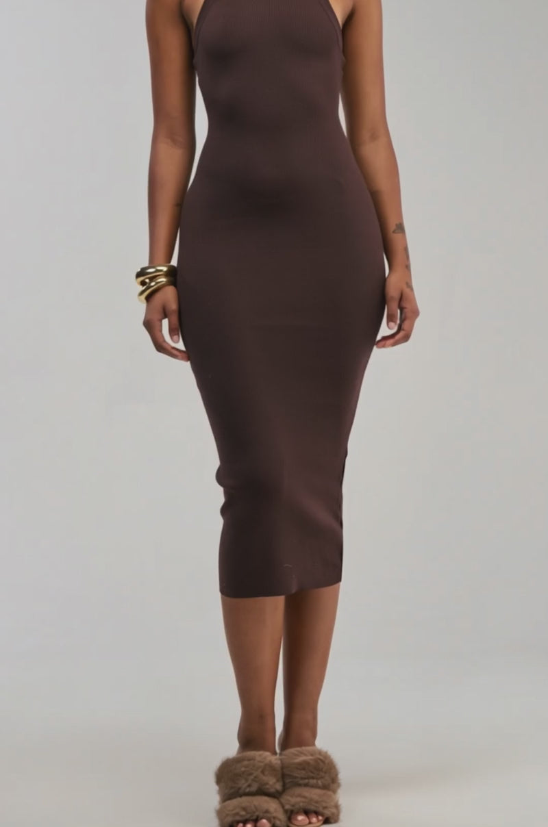 Video of a woman modeling the CUTIE PIE KNIT MIDI DRESS IN BROWN.
