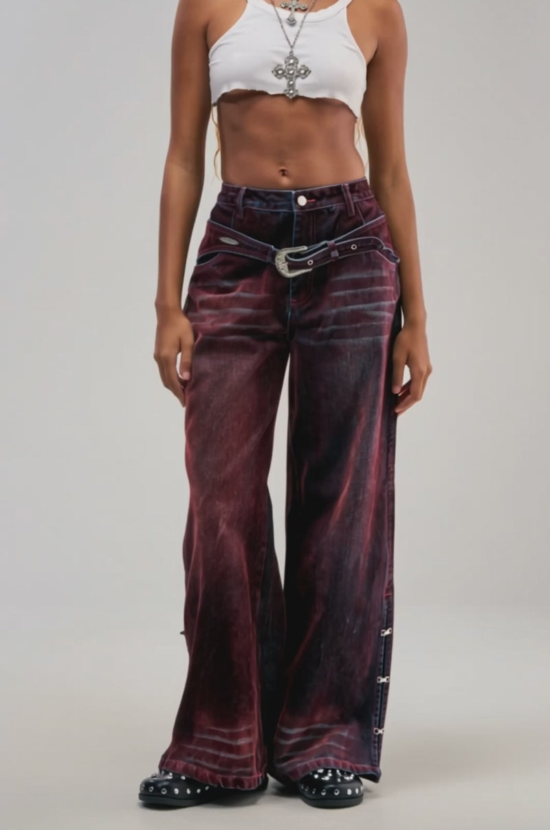 Video of a woman modeling the MIDNIGHT MERLOT VELVET DENIM PANTS—western-inspired, wide-leg jeans in burgundy velvet.