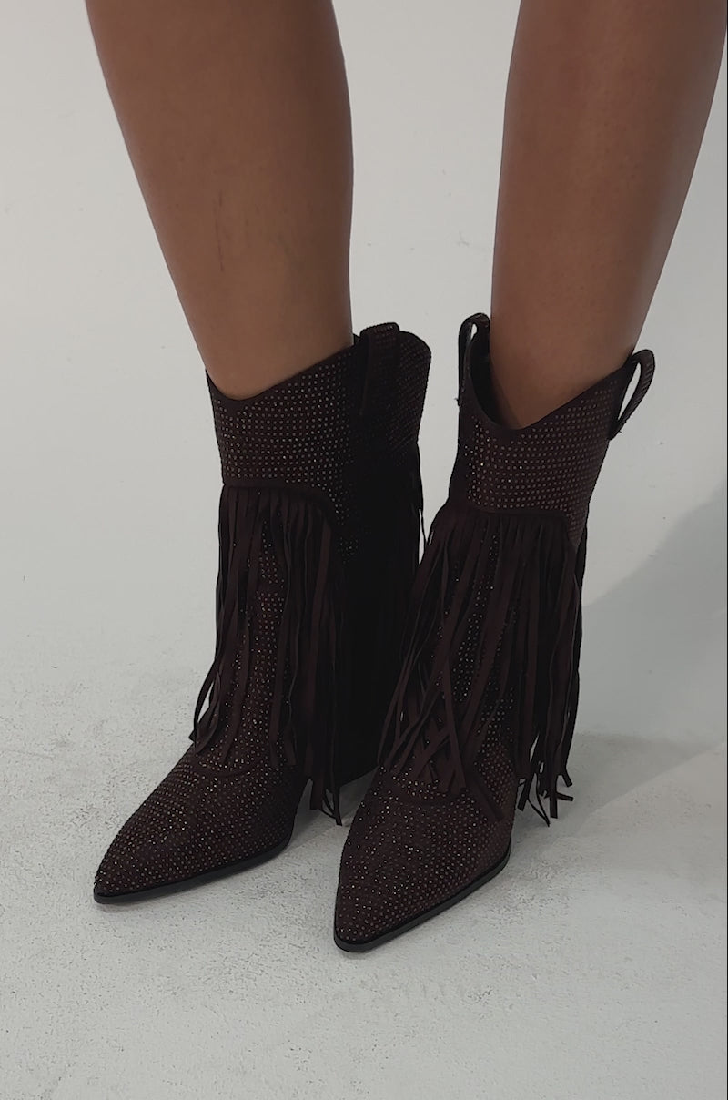 Video of woman modeling the AKIRA GOLD GREIANA BROWN RHINESTONE WESTERN BOOTIE.