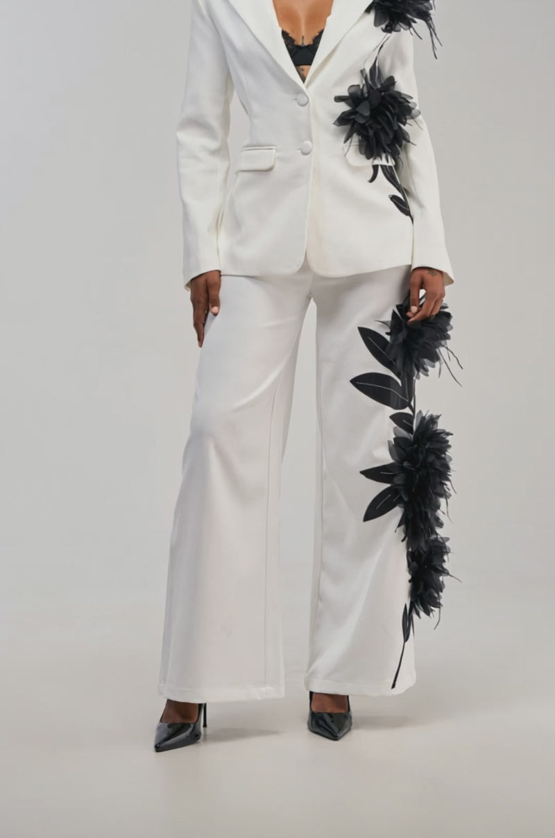Video of a woman modeling the IN FULL BLOOM APPLIQUE TROUSER.