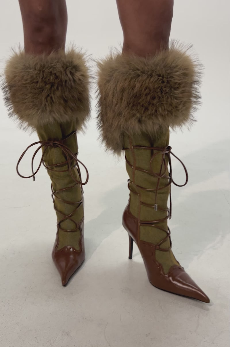 Video of woman modeling the AZALEA WANG OHARAR DENIM MULTI FUR DETAIL STILETTO BOOT, featuring brown leather, olive green suede, lace-up details, and fluffy faux fur trim at the top.