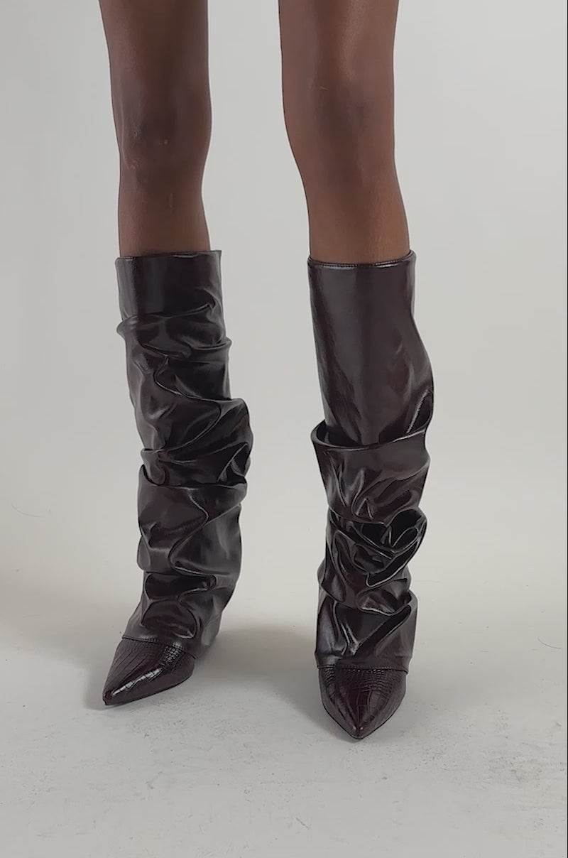 Video of a woman modeling the AZALEA WANG ZYLLA MAHOGANY WEDGE KNEE HIGH BOOTS. 