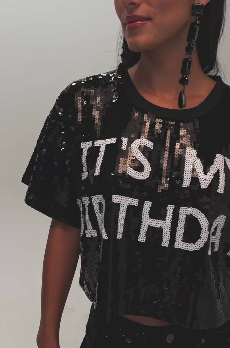 Video of a woman modeling the IT’S MY BIRTHDAY SEQUIN T-SHIRT.
