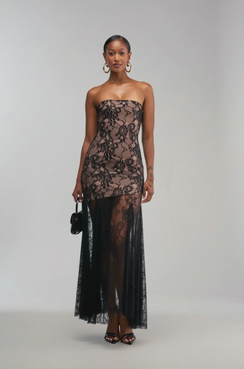 Video of a woman modeling the BARELY THERE LACE MAXI DRESS IN BLACK.