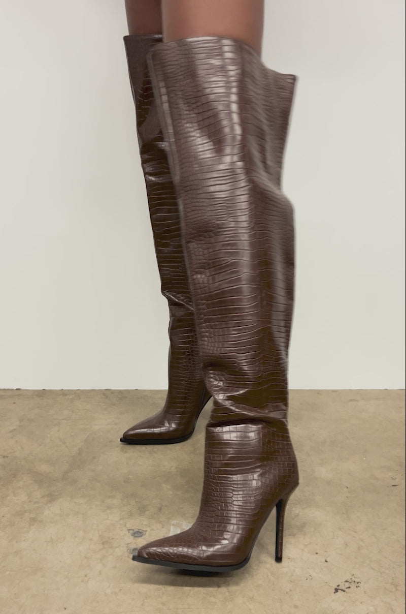 Video of woman modeling the AZALEA WANG LORAH CROC BROWN BOOTS 