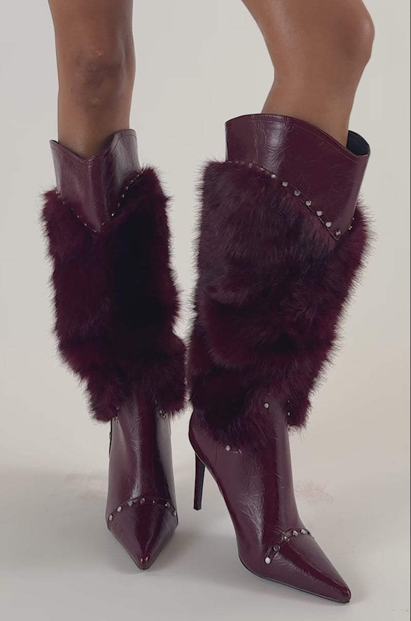 Video of a woman modeling the AZALEA WANG ALISETTE Burgundy Mixed Material Fur and Faux Leather Stiletto Boots.