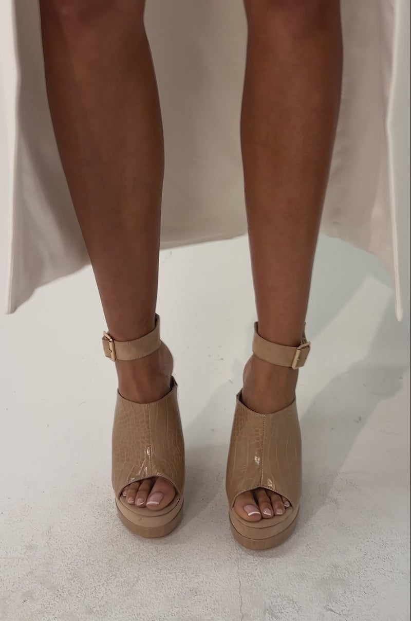 A video of a person in the AZALEA WANG TANA NUDE MIXED MATERIAL WEDGE sandals.