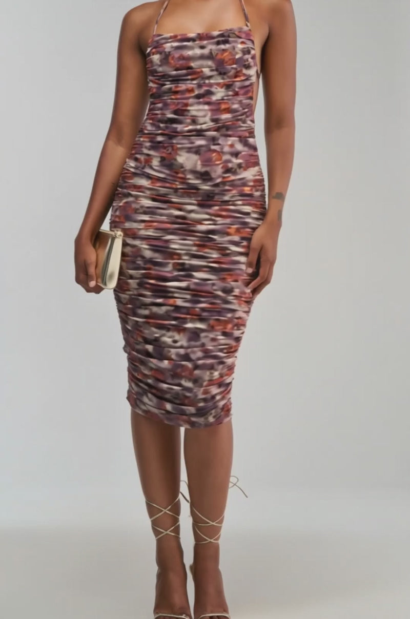 Video of a woman modeling the SWEET AS CANDY FLORAL BURNOUT MIDI DRESS.