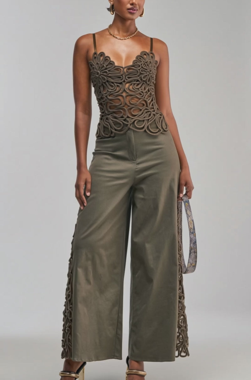 Video of a woman modeling the ITS GIVING ROPE DETAIL CORSET IN OLIVE.