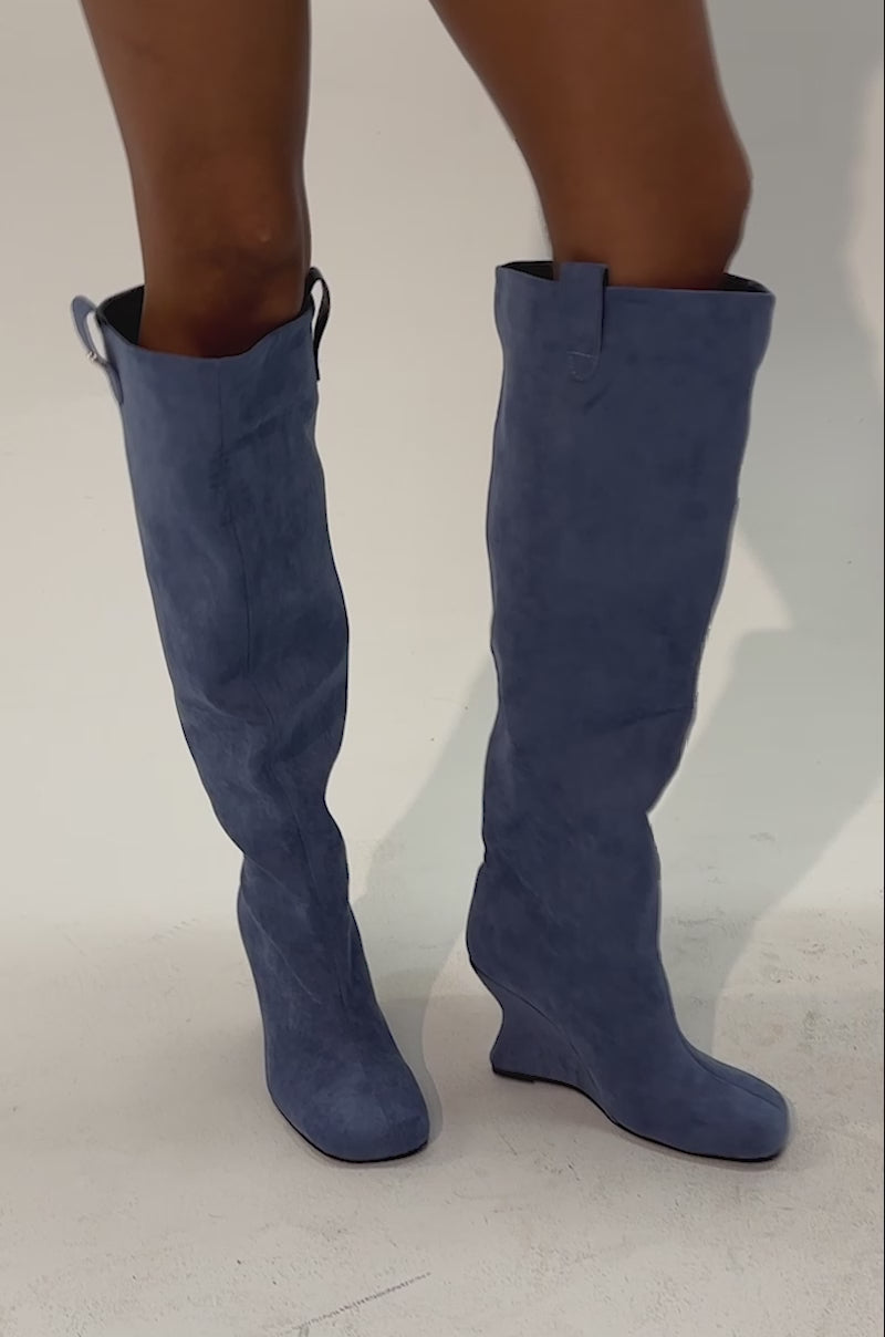 Video of a woman modeling the AZALEA WANG LIU BLUE FAUX SUEDE WEDGE BOOTIE.