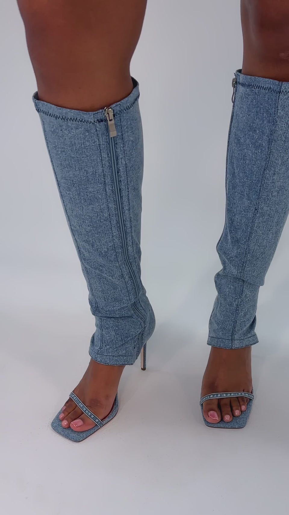 A video of a person wearing the AZALEA WANG ALISHAS DENIM GLADIATOR STILETTO SANDAL.