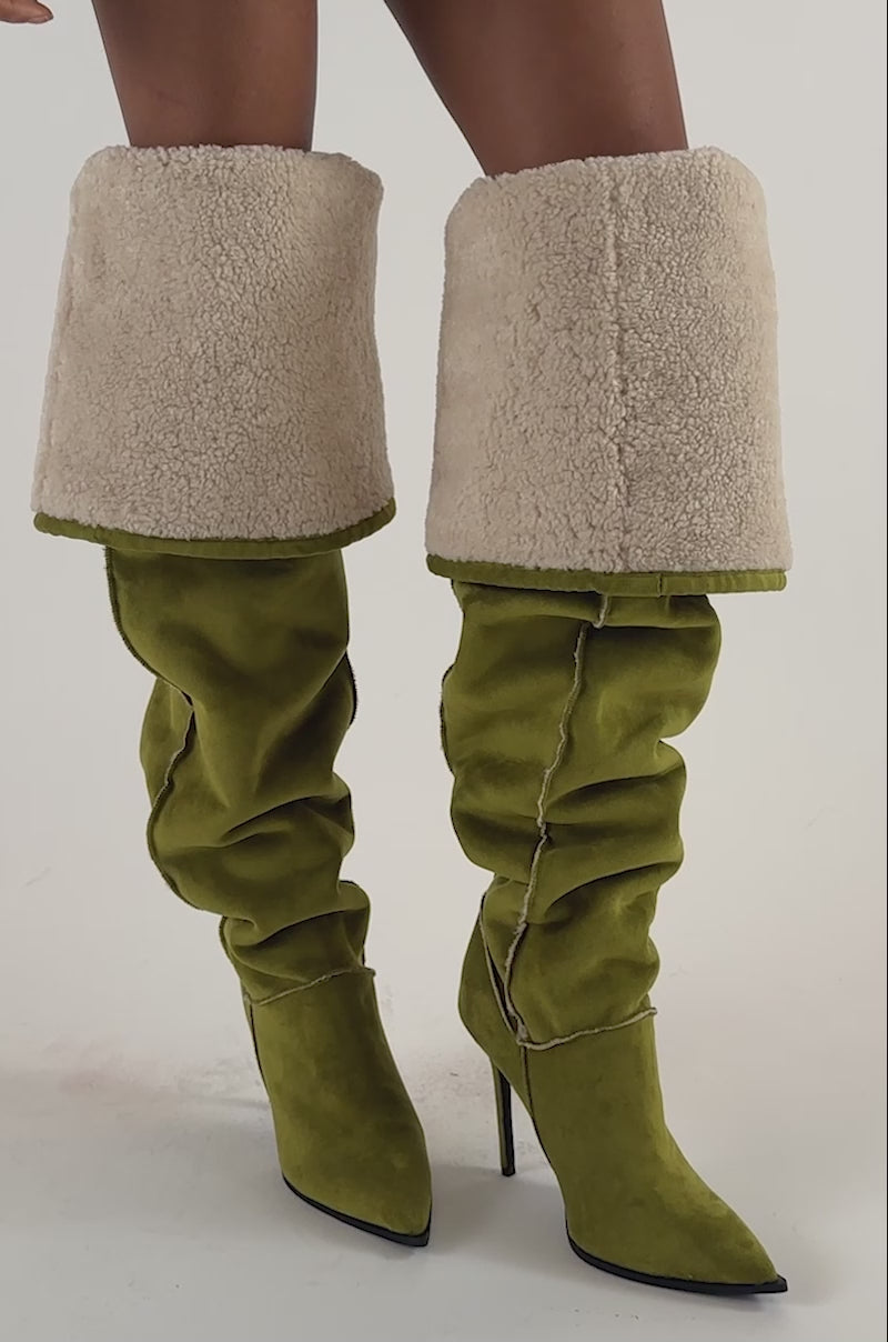 Video of a woman modeling the AZALEA WANG SONNET GREEN SUEDE STILETTO THIGH HIGH BOOT.