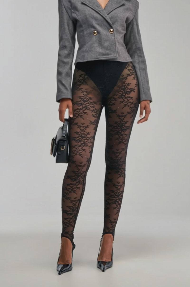 Video of a woman modeling the AMELIA LACE STIRRUP LEGGING.