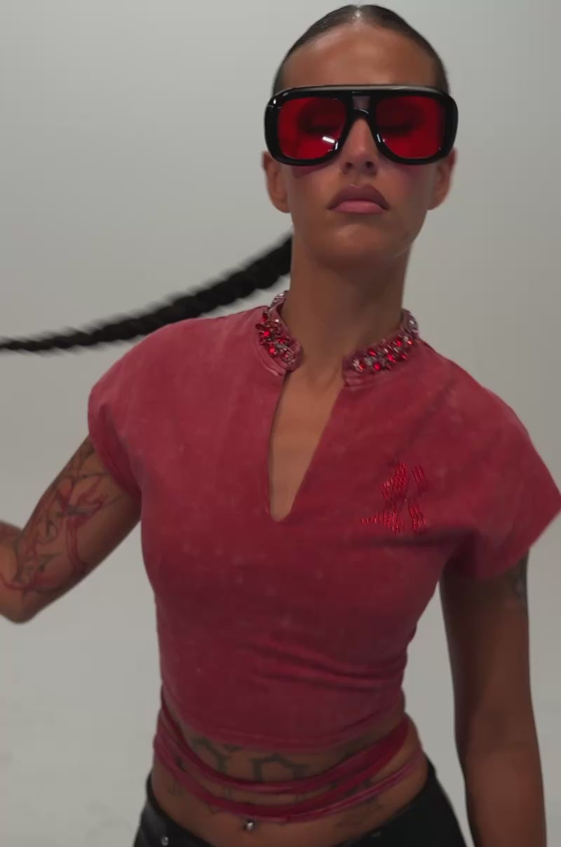 Video of a woman modeling the CHERRY ON TOP CROPPED TEE, a streetwear top featuring a beaded rhinestone collar.