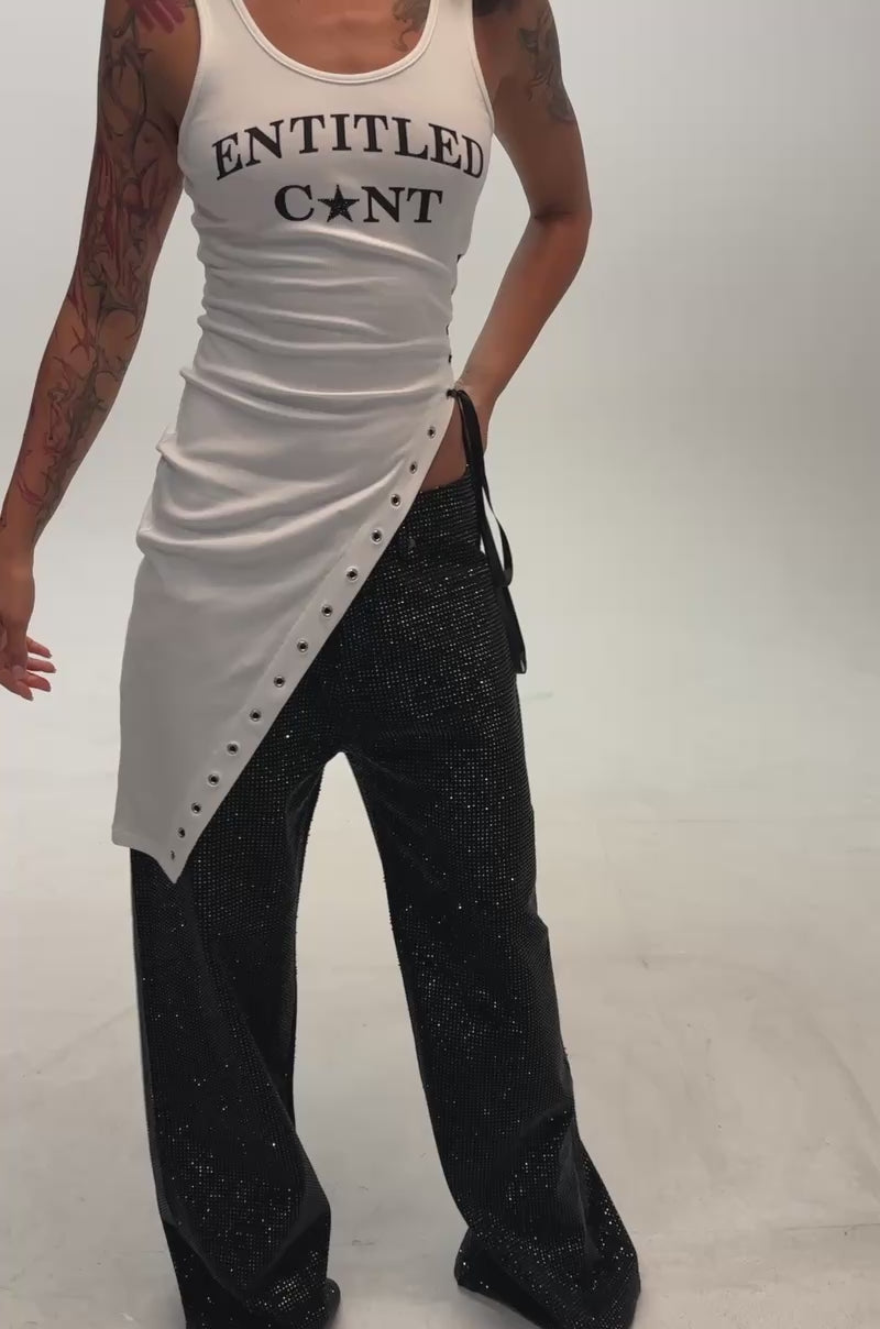 Video of a woman modeling the ENTITLED LONGLINE TANK TOP.