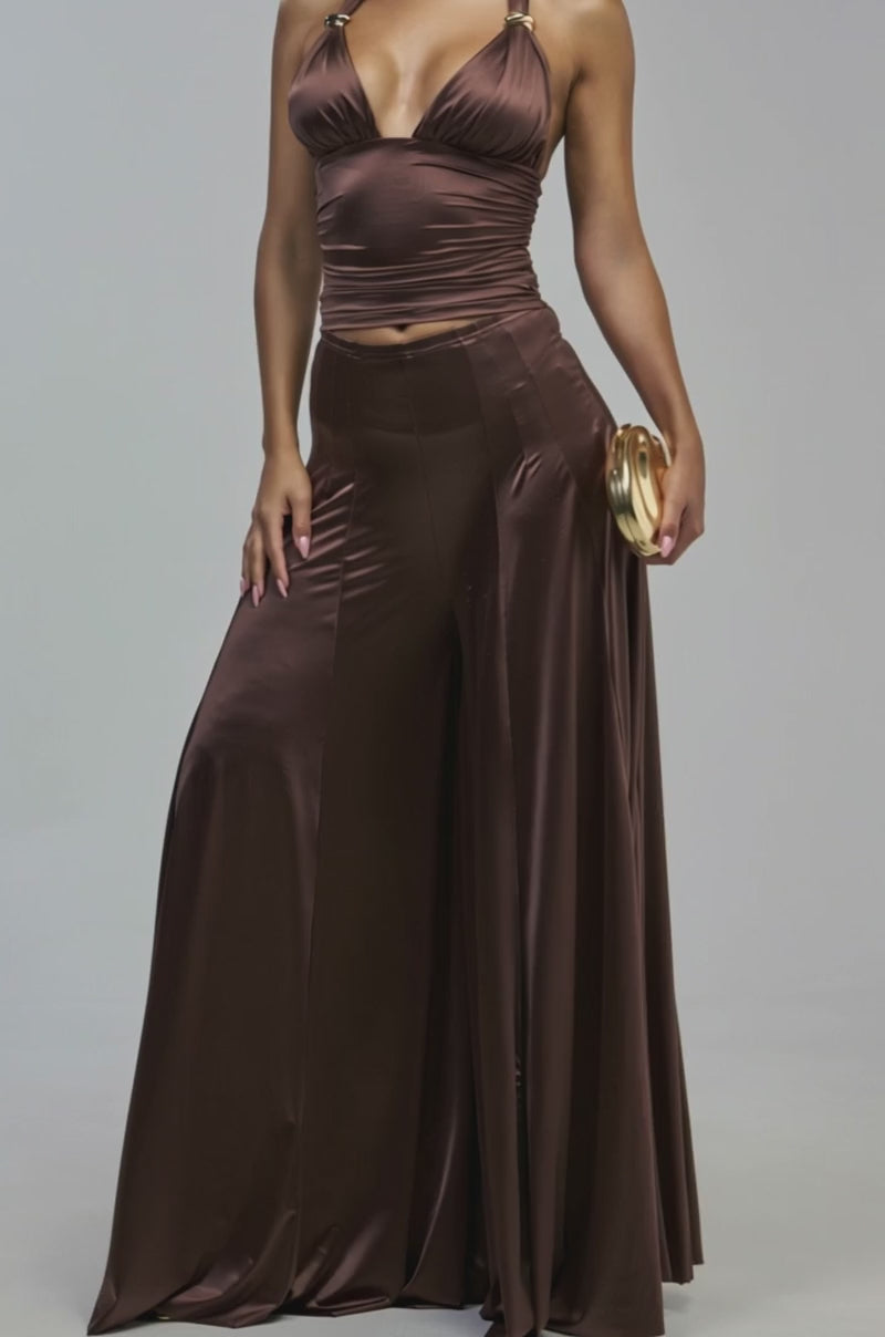 Video of a woman modeling the DANCE THE NIGHT AWAY BLOUSE—a chocolate brown satin halter top with a cropped silhouette.