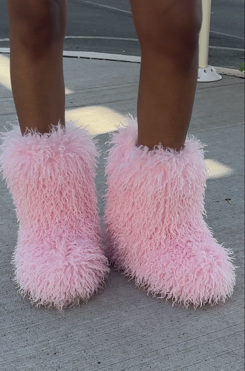 Video of woman modeling the AZALEA WANG AZAD PINK MOHAIR FLAT BOOTIE. 