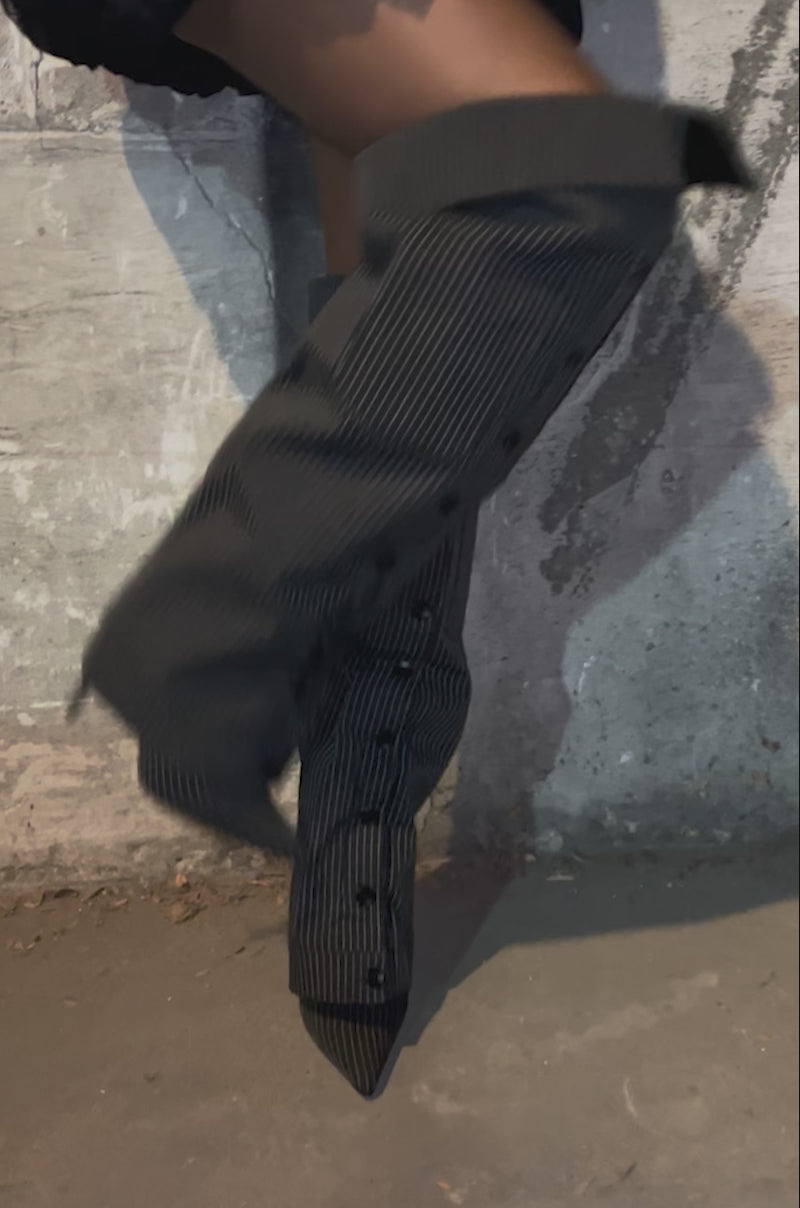 Video of woman modeling the AZALEA WANG IMRI BLACK SHIRTING STRIPED STILETTO BOOT 