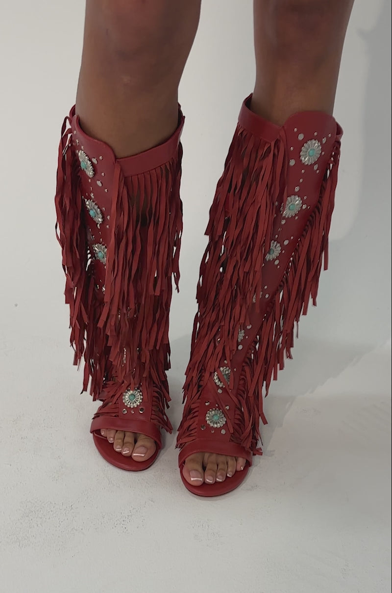 Video of woman modeling the AZALEA WANG DUSTINE RED MULTI GLADIATOR EMBELLISHED SANDALS  against a plain background.