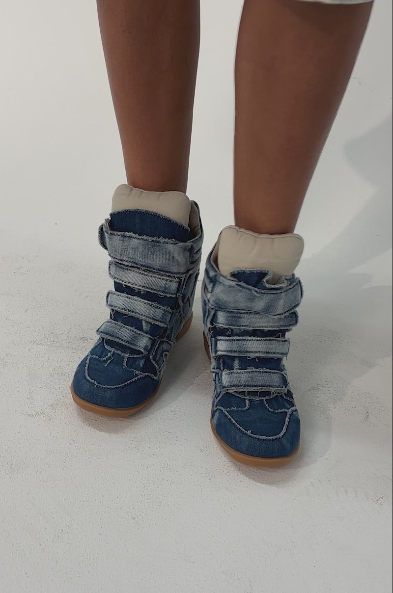 Video of woman modeling the AZALEA WANG BRYANT DENIM WEDGE SNEAKER with velcro straps