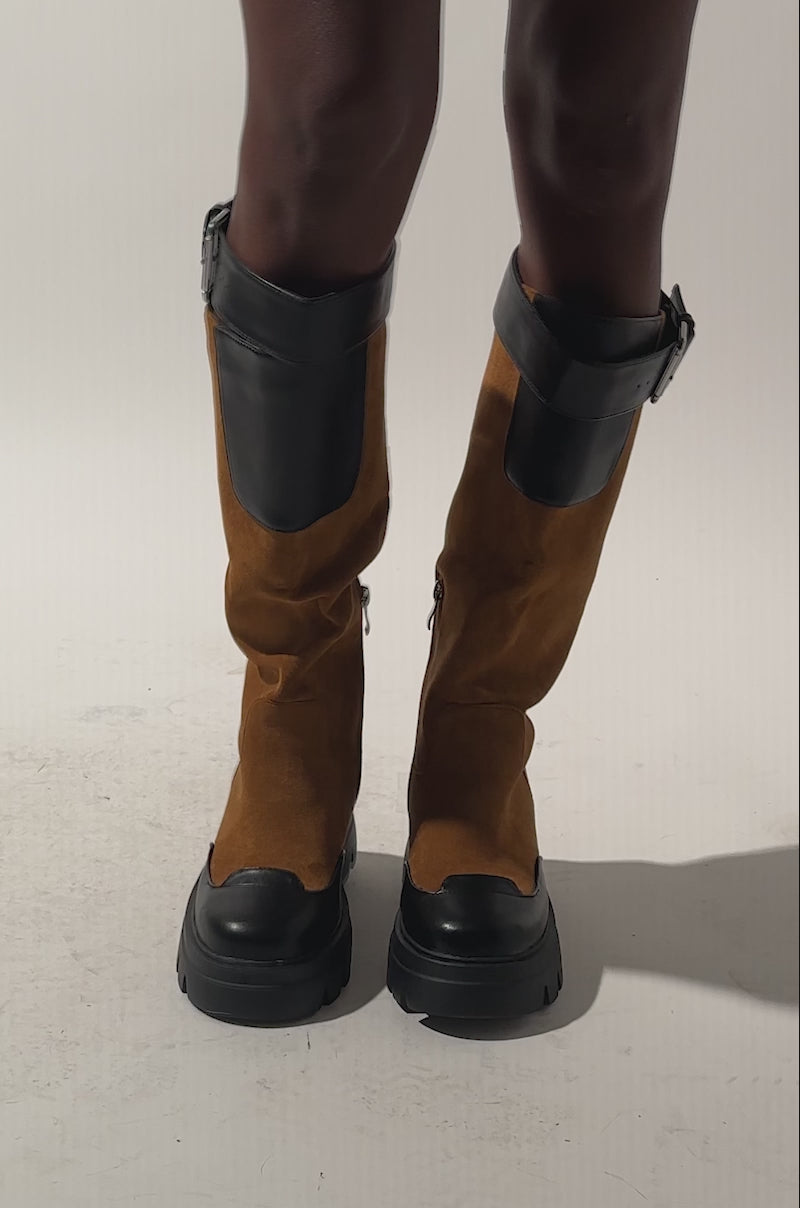 A video of a model wearing the AZALEA WANG DALILA COLOR BLOCKED FLATFORM BOOT.