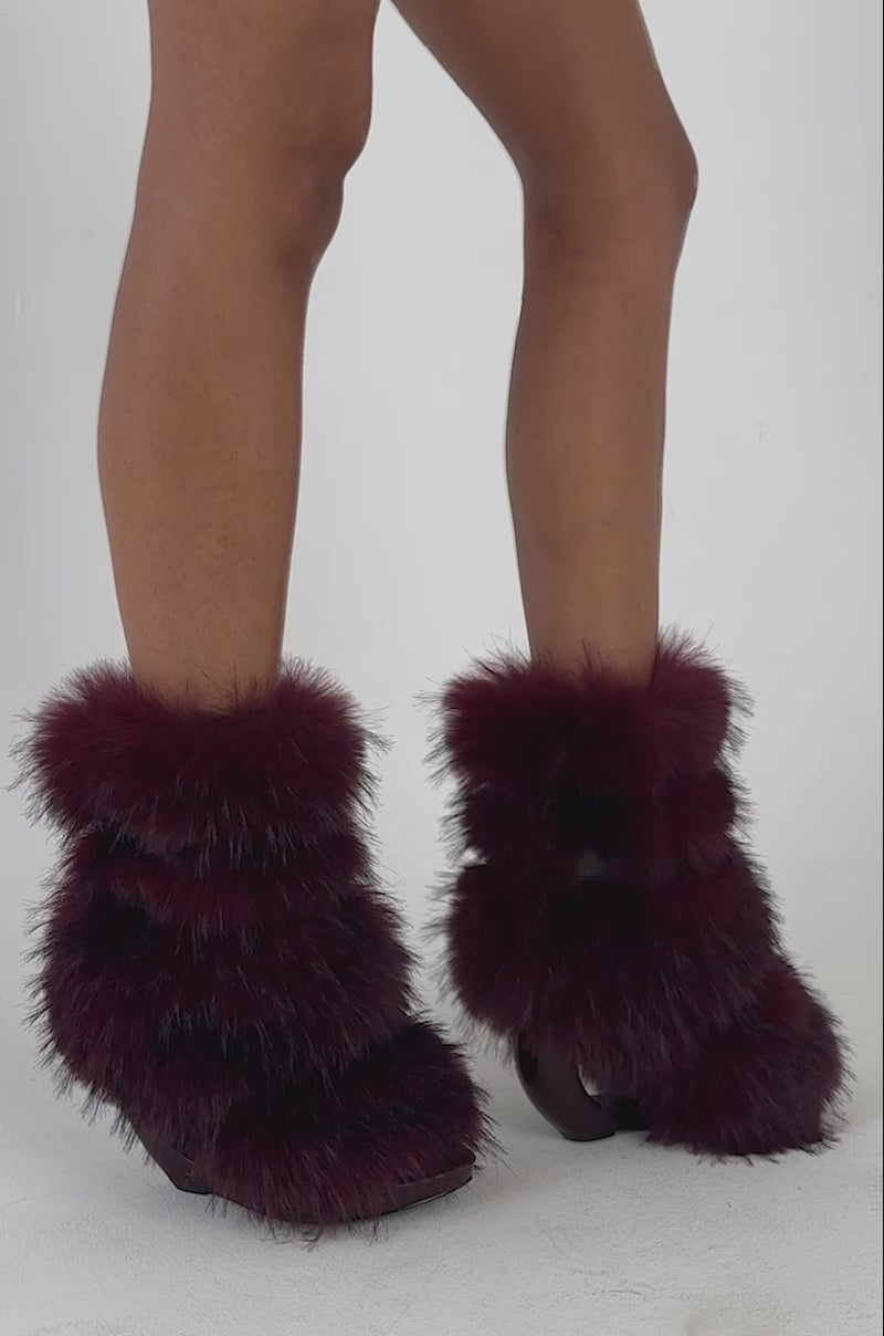 Video of a woman modeling the AZALEA WANG ELIANA BURGUNDY OPEN TOE WEDGE BOOTIE. 