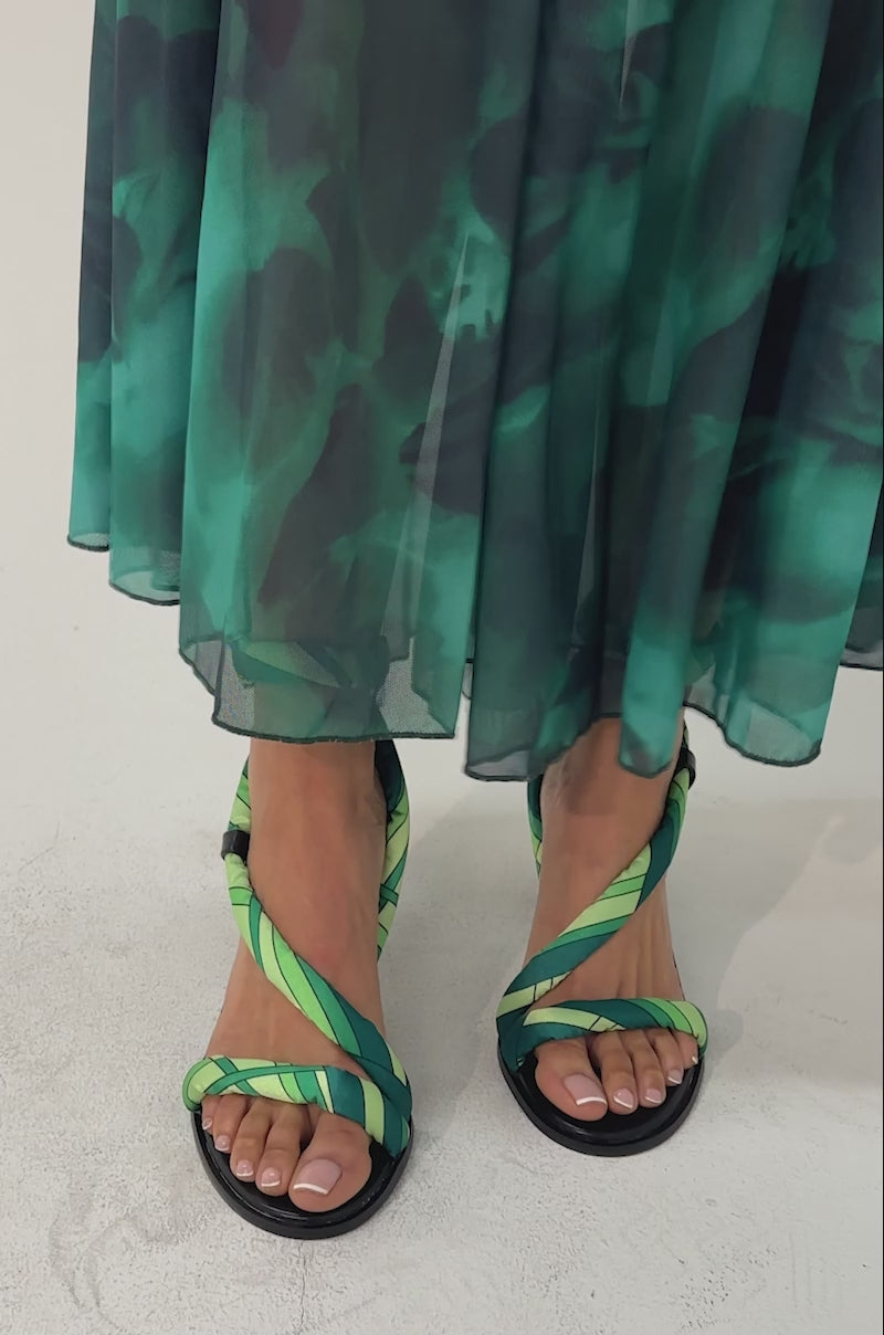 A video of a person wearing the AKIRA GOLD ABSTRACT PRINT PU STILETTO SANDAL.