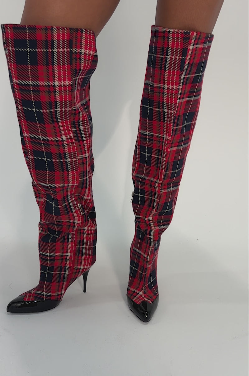 Video of woman modeling the AKIRA GOLD LOCHANA MULTI PLAID FLANNEL SEXY BOOT—tall, pointed-toe, over-the-knee boots with stiletto heels.