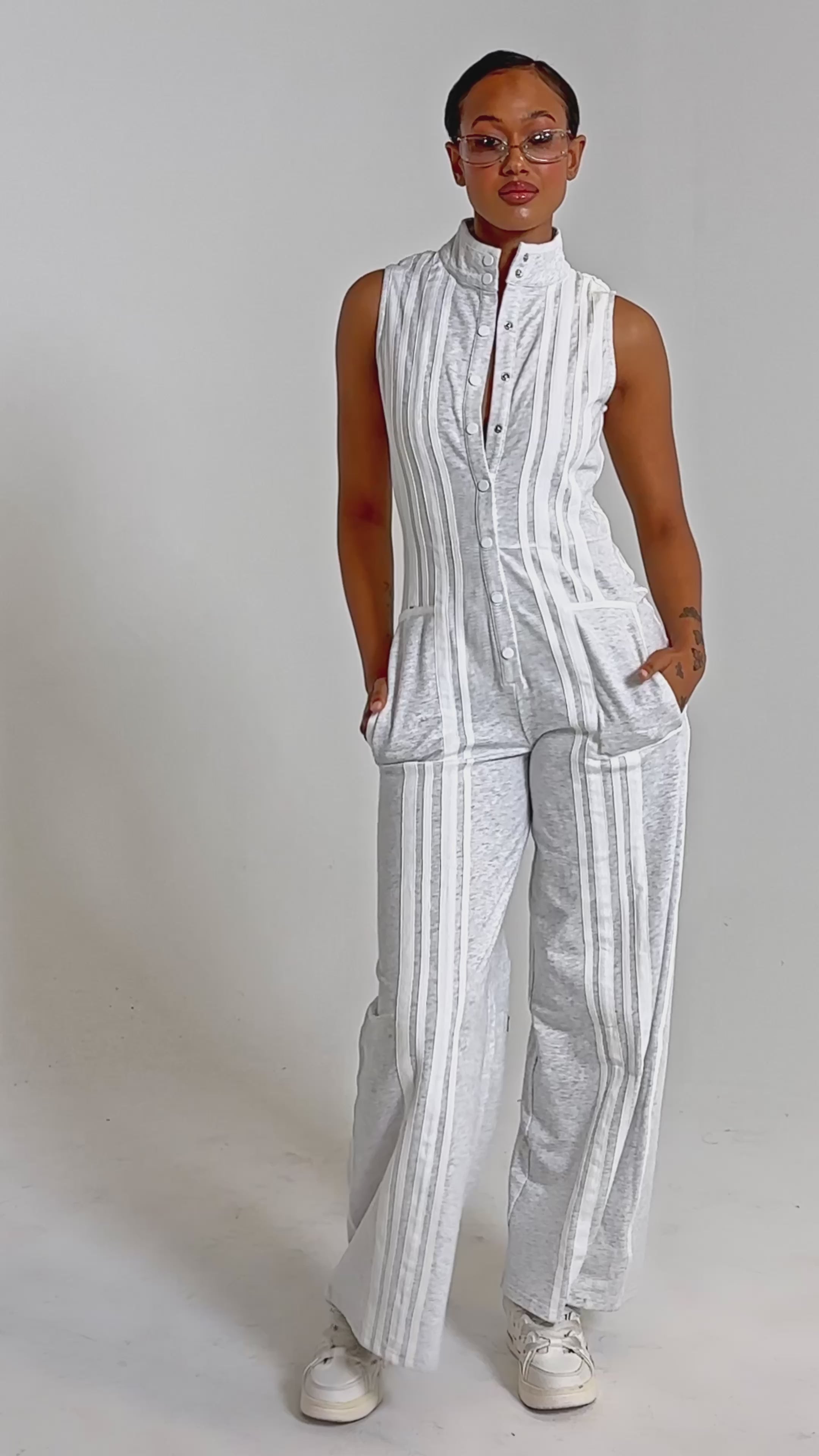 A video of a person wearing the BIG SPORTS GIRL JUMPSUIT.