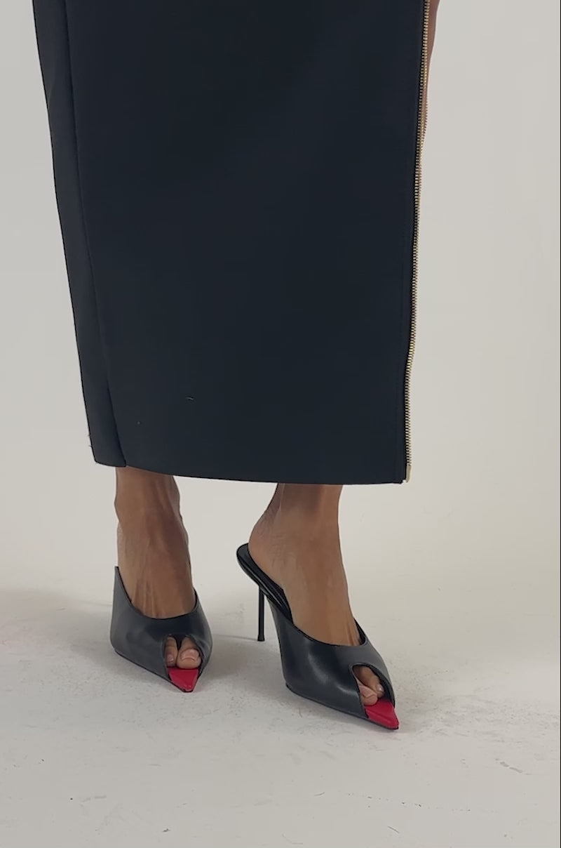 Video of a woman modeling the AZALEA WANG MONTSERRAT BLACK MULE STILETTO PUMPS.