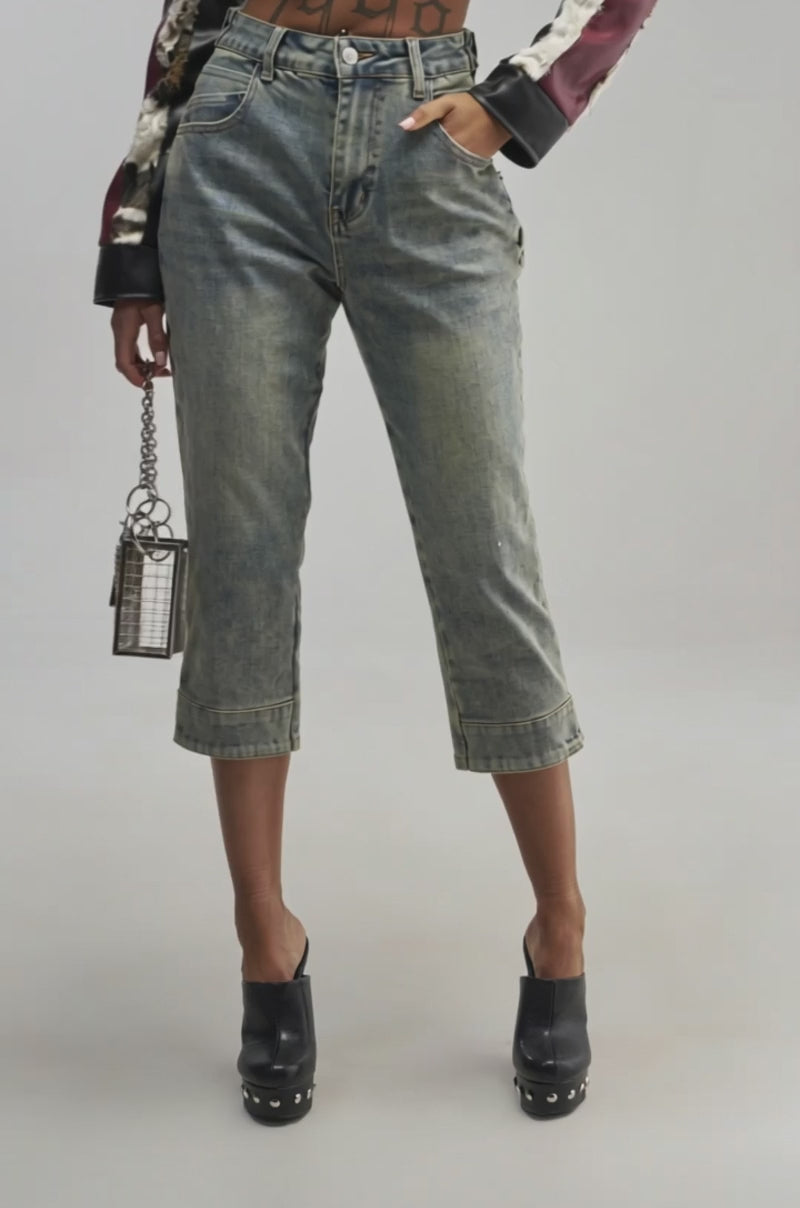 Video of a woman modeling the GIRLY POP CAPRI vintage-wash denim capri jeans.