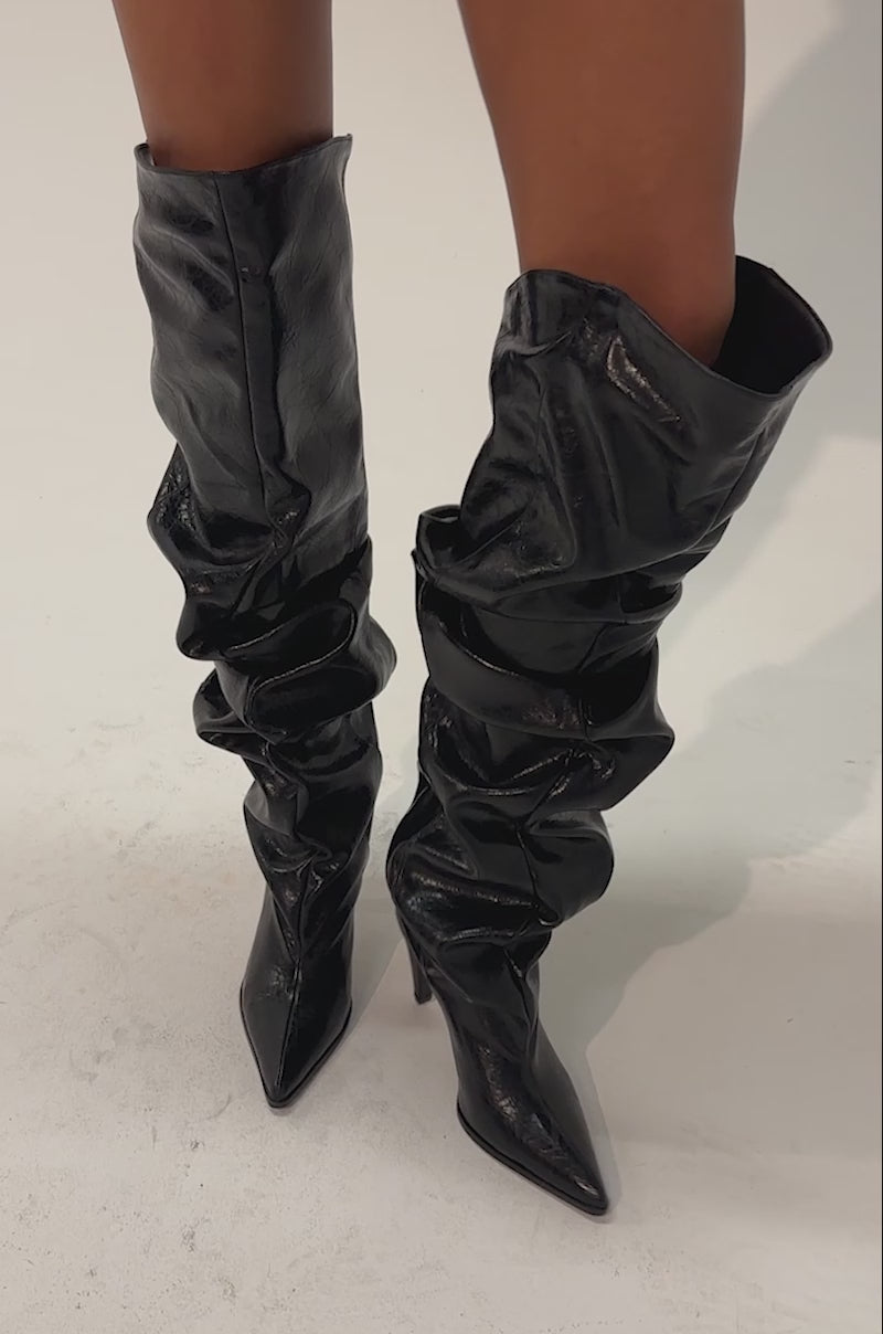 Video of a woman modeling the AZALEA WANG LARISSA BLACK STILETTO RUCHED BOOT.
