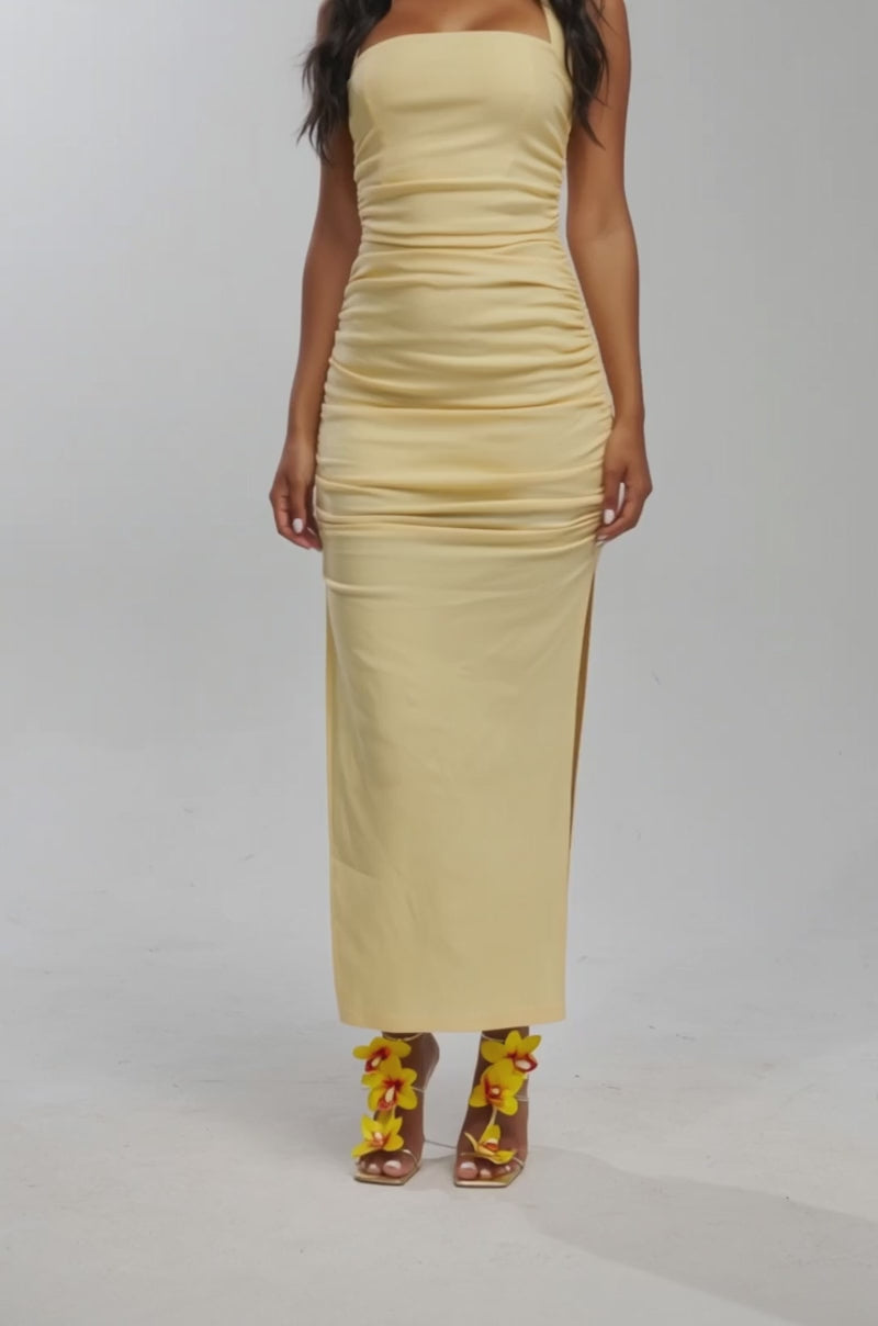 Video of woman modeling the RISKY BUSINESS POPLIN MIDI DRESS IN YELLOW styled with yellow floral sandals.