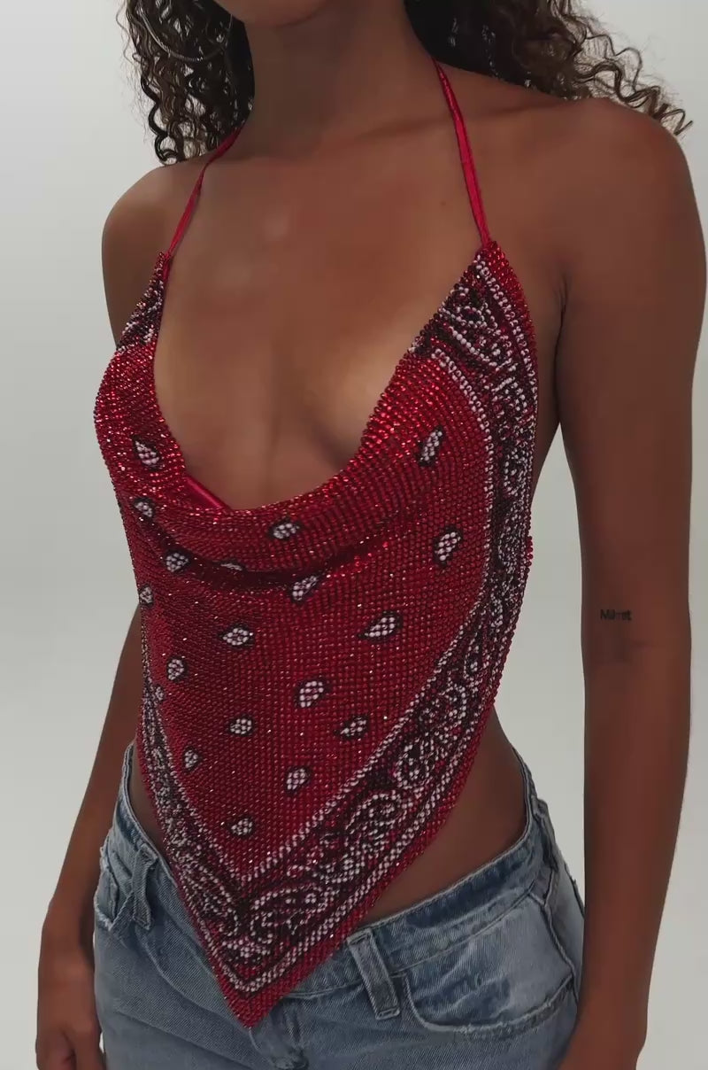Video of woman modeling the FOREVER AND EVER COWL NECK BLOUSE and light blue jeans, standing against a plain background—an eye-catching concert outfit.