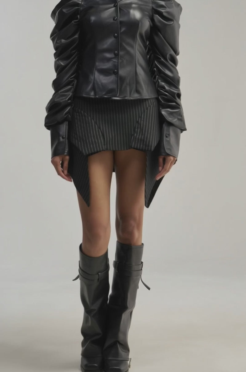 Video of a woman modeling the CRAZY IN LOVE BLACK FAUX LEATHER BUTTON DOWN BLOUSE.