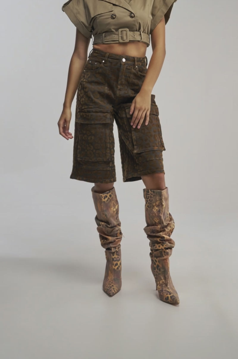 Video of woman modeling the CHEETAH GIRL BERMUDA SHORT and matching patterned slouchy high-heeled boots
