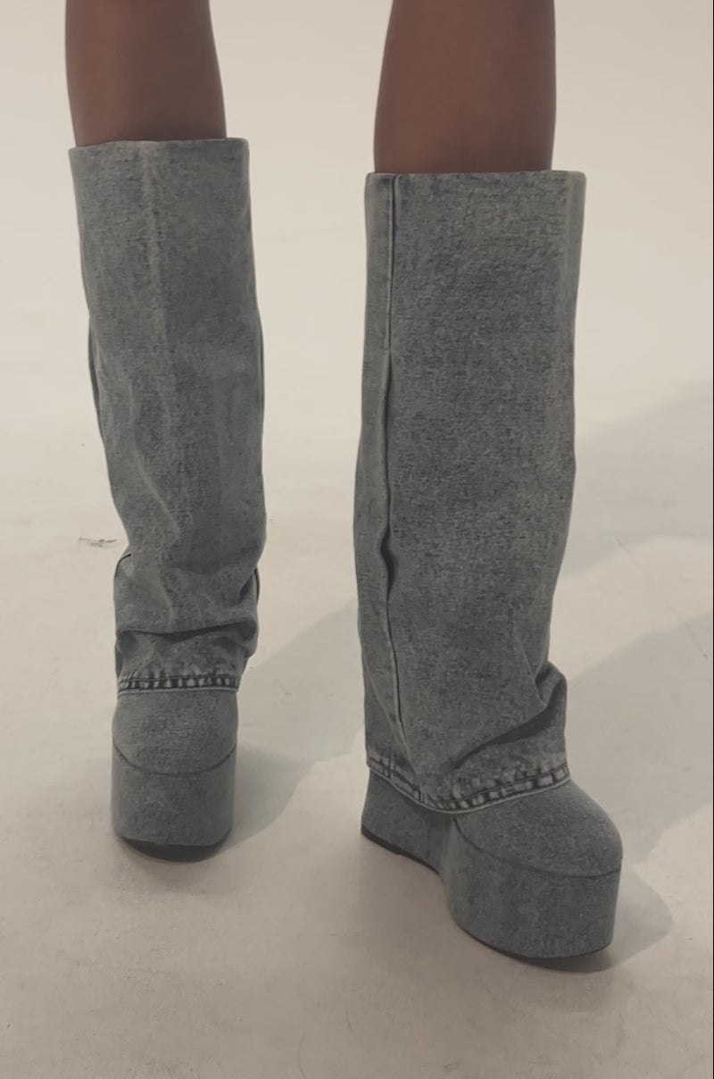 Video of woman modeling the AZALEA WANG FRANKEYE DENIM FLATFORM BOOTS