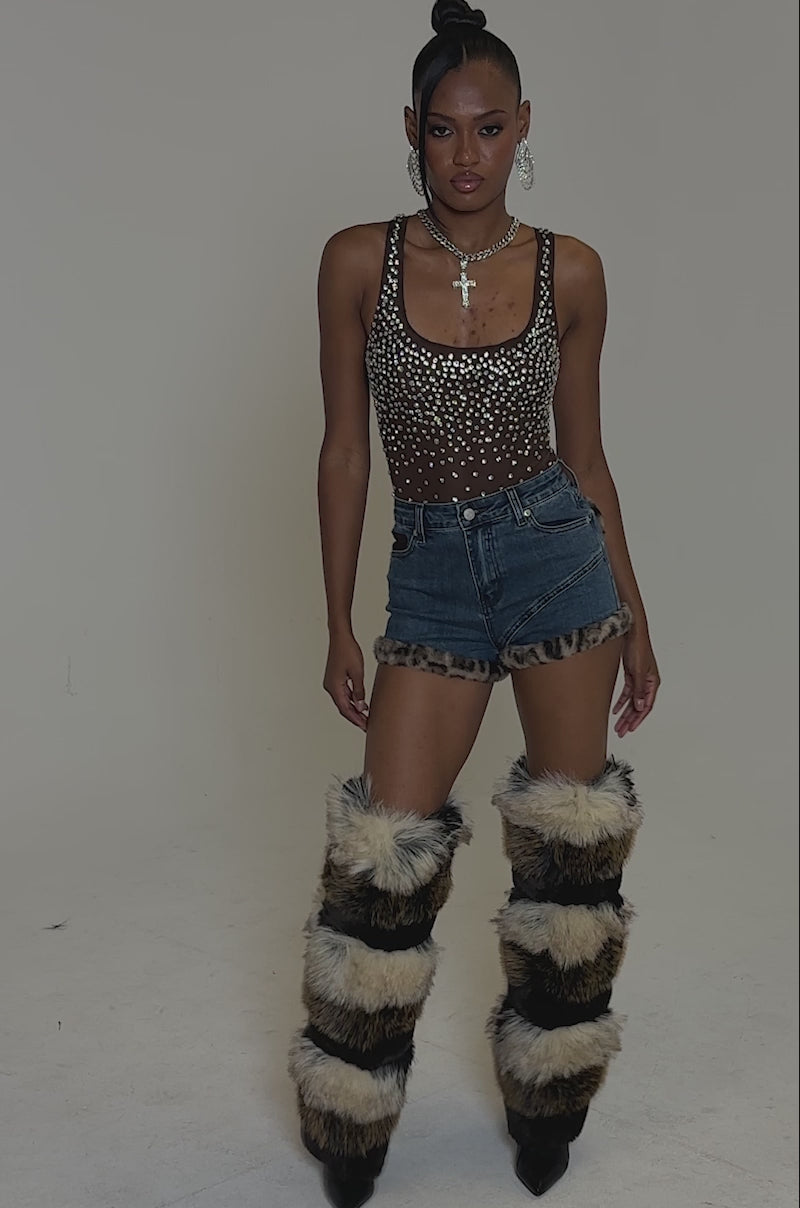 Video of woman modeling the POP IT OFF QUEEN RHINESTONE BODYSUIT.