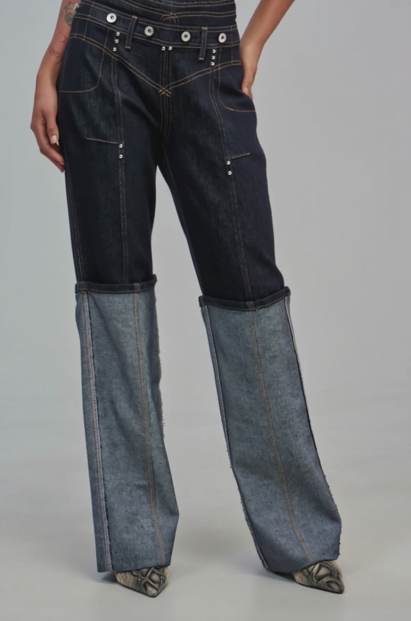 Video of a woman modeling the INSIDE OUT RELAXED DENIM.
