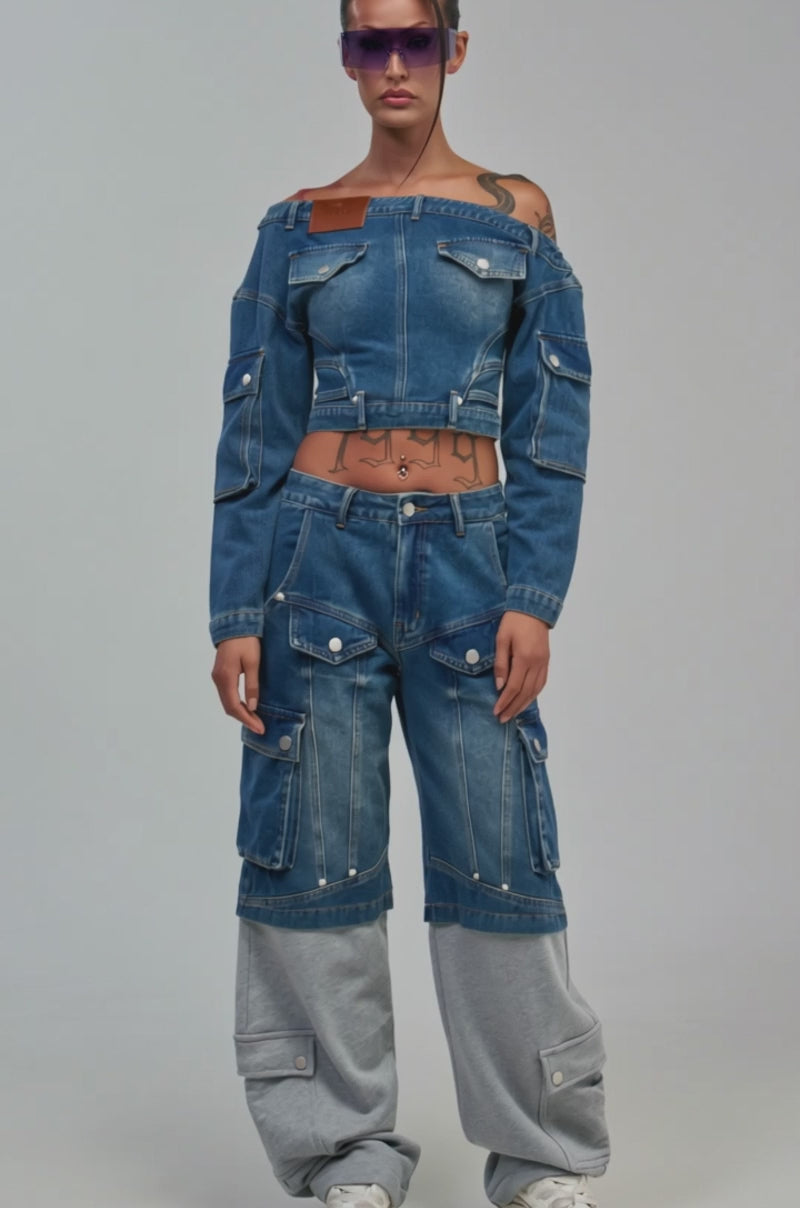 Video of a woman modeling the THE IT GIRL DENIM TOP.