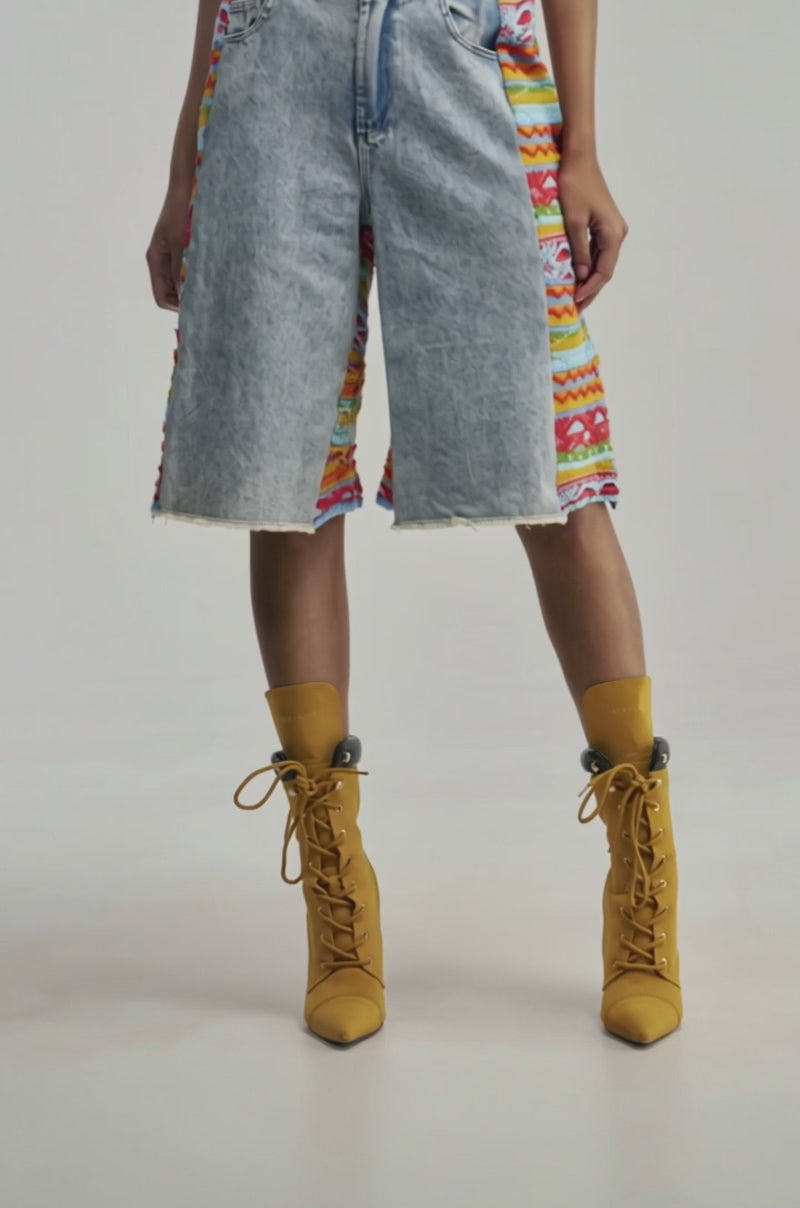 Video of a woman modeling the FEELS LIKE SUMMER KNIT BERMUDA SHORT.