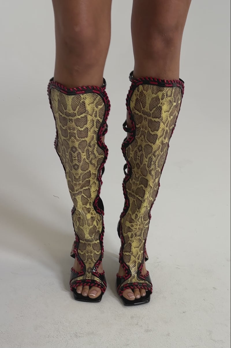 AZALEA WANG INDRANI HIGH SHAFT YELLOW SNAKE PRINT GLADIATOR SANDAL