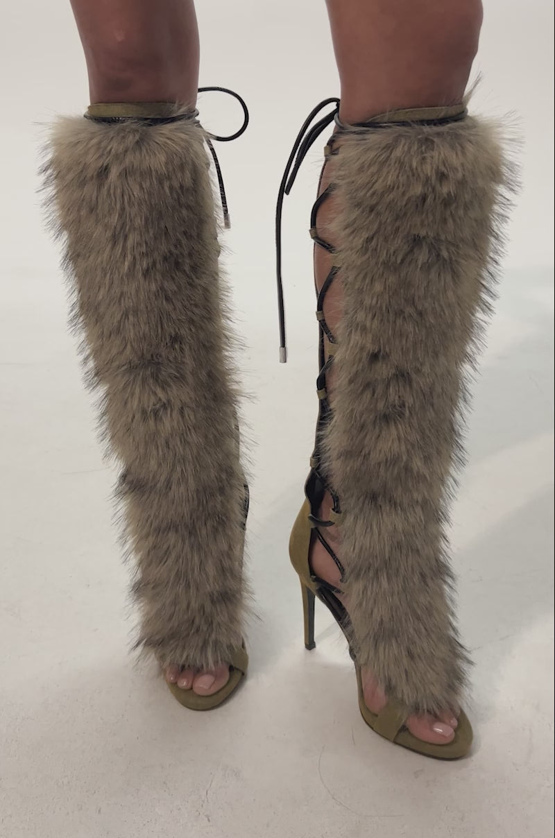 Video of woman modeling the AZALEA WANG STAMOS DENIM MULTI STILETTO SANDAL, styled with black leather shorts.