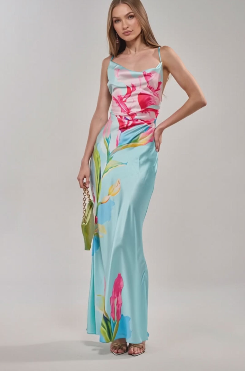 Video of woman modeling the THE MAIN EVENT FLORAL SATIN MAXI DRESS