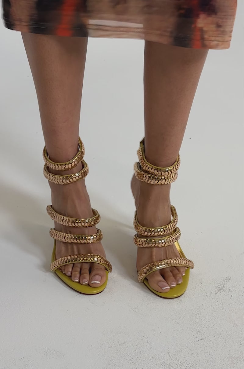 A video of a model wearing the AZALEA WANG MILA CITRON YELLOW GOLD HARDWARE EMBELLISHED STRAPPY STILETTO SANDALS.